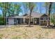 Charming single Gathering home with well-maintained lawn, and a one-car garage at 912 Westside Dr, Newton, NC 28658
