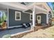 Charming front entrance of home with seating area, stone accents, and a welcoming door at 912 Westside Dr, Newton, NC 28658