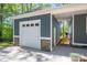 Attached garage with white door and stone accents, providing convenient parking at 912 Westside Dr, Newton, NC 28658