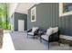 View of outdoor patio featuring two chairs with cushions, great for relaxing outdoors at 912 Westside Dr, Newton, NC 28658