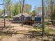 Beautiful back exterior with deck and well-maintained yard at 912 Westside Dr, Newton, NC 28658