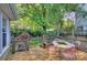 View of a back deck with patio furniture and decorative features at 1000 E 35Th St, Charlotte, NC 28205