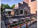 Attractive patio featuring an outdoor dining area and stylish landscaping, perfect for entertaining at 1000 E 35Th St, Charlotte, NC 28205