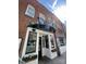 Charming brick building with a covered entrance and decorative flower boxes enhancing curb appeal at 1000 E 35Th St, Charlotte, NC 28205