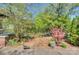 Street view of home exterior showcasing a landscaped front yard at 1000 E 35Th St, Charlotte, NC 28205