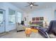 Sunlit living room with hardwood floors and charming accents at 1000 E 35Th St, Charlotte, NC 28205