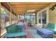 Relaxing sunroom with wood ceiling, skylight, and comfortable seating at 1000 E 35Th St, Charlotte, NC 28205