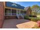 Stunning backyard with a brick patio and screened-in porch, perfect for outdoor relaxation at 105 Snead Ct, Salisbury, NC 28144
