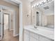 Bathroom vanity with white cabinets and a mirror at 105 Snead Ct, Salisbury, NC 28144