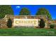 Elegant stone sign marking the entrance to Crescent Golf & Country Club, surrounded by lush landscaping at 105 Snead Ct, Salisbury, NC 28144