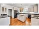 Modern kitchen featuring stainless steel appliances, island, and granite countertops at 105 Snead Ct, Salisbury, NC 28144