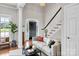 Inviting living room features a neutral color palette and staircase at 105 Snead Ct, Salisbury, NC 28144