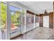 Screened porch with brick flooring and views of the backyard at 105 Snead Ct, Salisbury, NC 28144