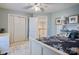 Well-lit bedroom with a twin bed, storage, and closet space, offering functionality at 1050 Merrywood Dr, Newton, NC 28658