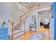Grand foyer showcasing staircase, hardwood floors, and an open, airy design at 1050 Merrywood Dr, Newton, NC 28658