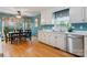 Eat-in kitchen with a bay window and stainless steel appliances at 1050 Merrywood Dr, Newton, NC 28658