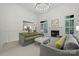 Spacious living room with high ceilings, fireplace, and large windows, offering a comfortable area at 11424 Stonebriar Dr, Charlotte, NC 28277