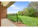 Charming porch overlooking a large yard, blending outdoor living with natural beauty and tranquility at 121 Capstone Ct, Statesville, NC 28625