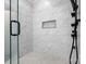 Spa-like glass enclosed shower with elegant marble tiling and modern fixtures at 121 Capstone Ct, Statesville, NC 28625