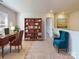 Cozy bonus room featuring a bookshelf, desk, and a comfortable armchair at 1216 Morehead Dr, Salisbury, NC 28144