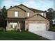 Charming two-story home featuring stone accents, neutral siding, and a well-maintained front lawn at 1216 Morehead Dr, Salisbury, NC 28144