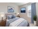Cozy main bedroom with a queen-size bed, modern decor, and ample natural light at 1216 Morehead Dr, Salisbury, NC 28144