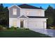 Two-story home with gray and white color scheme, a two-car garage, and landscaped front yard at 1259 Morehead Dr, Salisbury, NC 28144