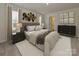 Stylish main bedroom with decorative wall art, carpet, and large windows at 1259 Morehead Dr, Salisbury, NC 28144