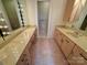 Elegant bathroom with double vanities, ample lighting, and a separate shower at 1300 Queens Rd # 210, Charlotte, NC 28207