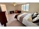 Spacious bedroom with parquet floors, neutral tones, and lots of natural light at 1300 Queens Rd # 210, Charlotte, NC 28207
