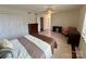 Comfortable bedroom with parquet floors, neutral tones, and lots of natural light at 1300 Queens Rd # 210, Charlotte, NC 28207