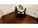 Cozy dining area with a glass-top table set, perfect for intimate meals at 1300 Queens Rd # 210, Charlotte, NC 28207