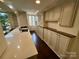 Charming kitchen featuring spacious countertops, custom cabinetry, and a gas stove at 1300 Queens Rd # 210, Charlotte, NC 28207