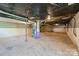 Spacious unfinished basement with concrete floor, offering ample storage or customization options at 1337 Eastside Ave, Albemarle, NC 28001