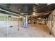 Unfinished basement with utilities, exposed ductwork, and potential for customization at 1337 Eastside Ave, Albemarle, NC 28001