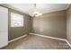 Cozy dining room boasts tile floors, neutral wall color, and a modern chandelier, perfect for Gathering meals at 1337 Eastside Ave, Albemarle, NC 28001