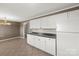 Eat-in kitchen featuring ample cabinets and countertop space at 1337 Eastside Ave, Albemarle, NC 28001