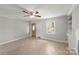 Neutral living room featuring wood paneling and tiled flooring at 1337 Eastside Ave, Albemarle, NC 28001