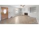 Bright living room with tiled floor, built in shelves, and a fireplace at 1337 Eastside Ave, Albemarle, NC 28001