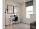 Second floor featuring a functional desk, chair and lamp with natural lighting for the perfect office space at 143 Shepherds Landing Dr, Mooresville, NC 28115