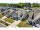 Aerial view featuring the home, driveway, and surrounding neighborhood at 15710 Oleander Dr, Charlotte, NC 28278