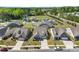 Beautiful aerial view of homes and green space with mature trees in a suburban neighborhood at 15710 Oleander Dr, Charlotte, NC 28278
