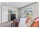 Bedroom featuring a dresser with a TV and view to neighborhood at 15710 Oleander Dr, Charlotte, NC 28278