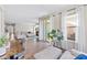 Open concept living room featuring a comfortable seating area and natural light at 15710 Oleander Dr, Charlotte, NC 28278