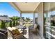 Covered patio with comfortable seating and an outdoor view of the backyard at 15710 Oleander Dr, Charlotte, NC 28278