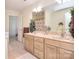 Bathroom featuring double sinks, neutral countertop, and spacious layout at 16610 Blackberry Hills Dr, Midland, NC 28107
