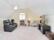 Spacious bonus room featuring a ceiling fan, media center, and comfortable seating at 16610 Blackberry Hills Dr, Midland, NC 28107