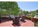 Relaxing deck with wicker furniture, outdoor plants and views of the neighborhood at 16610 Blackberry Hills Dr, Midland, NC 28107