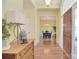 Bright foyer leading to the dining room features hardwood floors and elegant décor at 16610 Blackberry Hills Dr, Midland, NC 28107