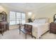 Bright bedroom with a large window, white bedding, and natural light at 16610 Blackberry Hills Dr, Midland, NC 28107